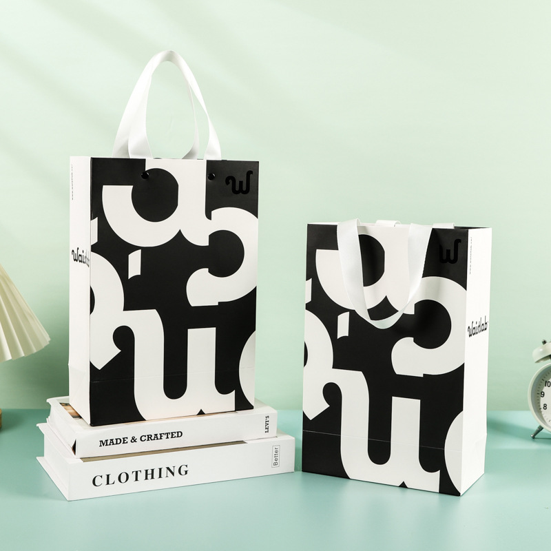 Hand-held paper bags are available for wholesale, including gift shopping bags, clothing bags, gift bags, cosmetics and jewelry bags. Logos can be printed pic 8