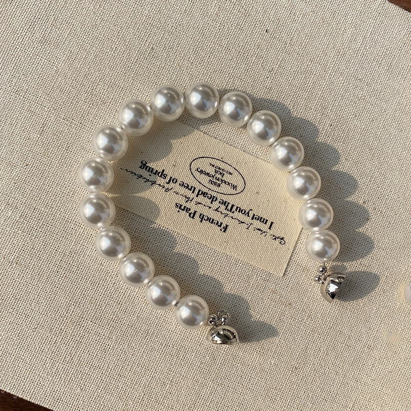 This is a trendy accessory for women, featuring a strong Australian white round magnetic pearl bracelet. It exudes a light luxury, niche and high-end vibe pic 37