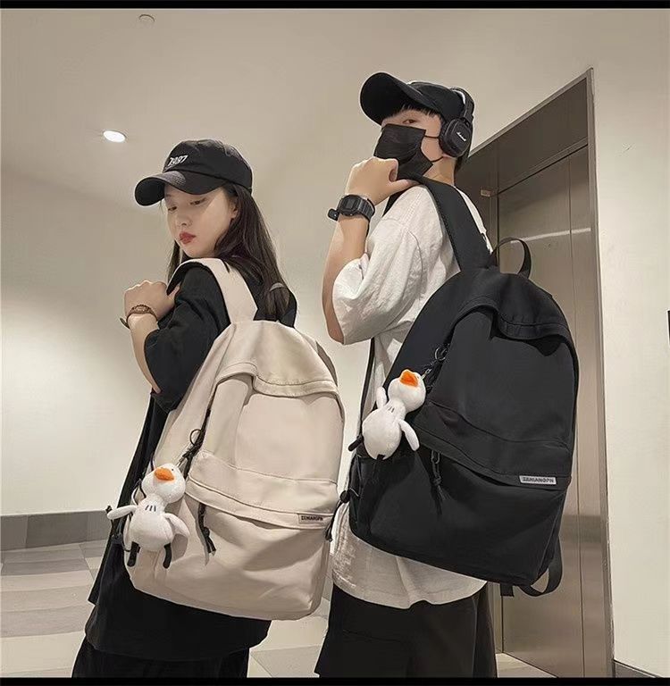 日系初高中学生上课书包男新款洋气质感纯色简约休闲女生双肩背包详情8