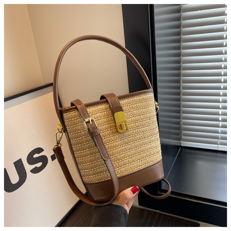 时尚手提编织包包女2023新款高级质感草编包单肩斜挎包休闲水桶包详情28