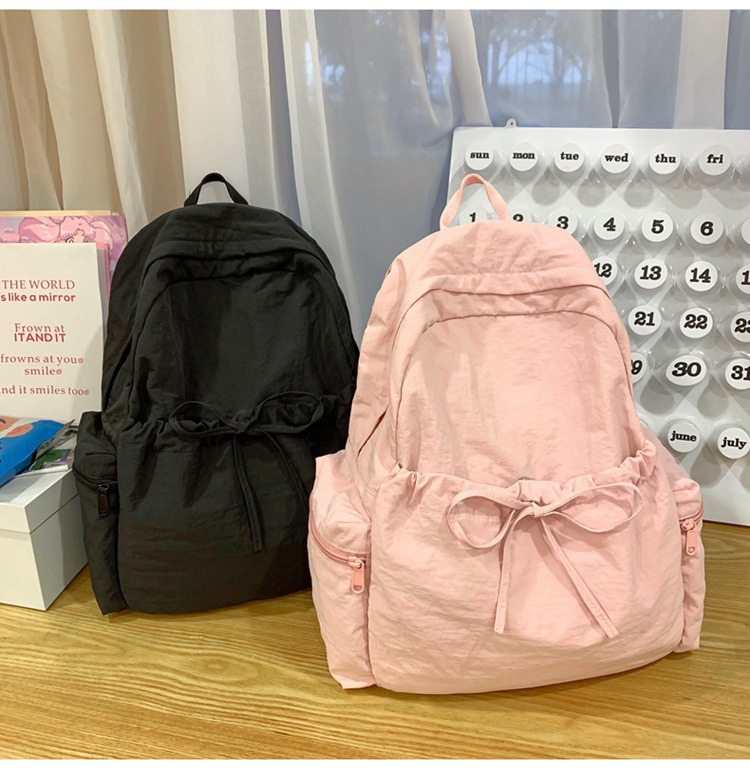 新款时尚轻便简约双肩包女日系文艺学生书包休闲运动旅行纯色背包详情32