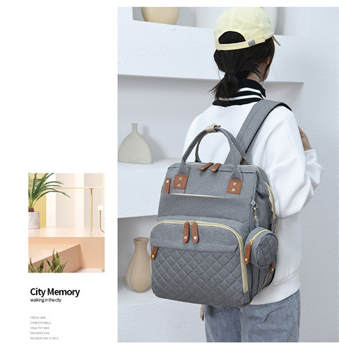 跨境专供高级感妈咪包大容量轻便母婴床包挂童车多功能手提双肩包详情23