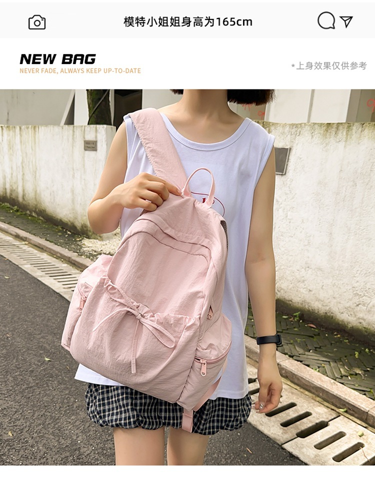 新款时尚轻便简约双肩包女日系文艺学生书包休闲运动旅行纯色背包详情3