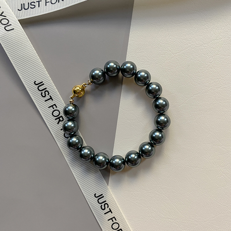 This is a trendy accessory for women, featuring a strong Australian white round magnetic pearl bracelet. It exudes a light luxury, niche and high-end vibe pic 18