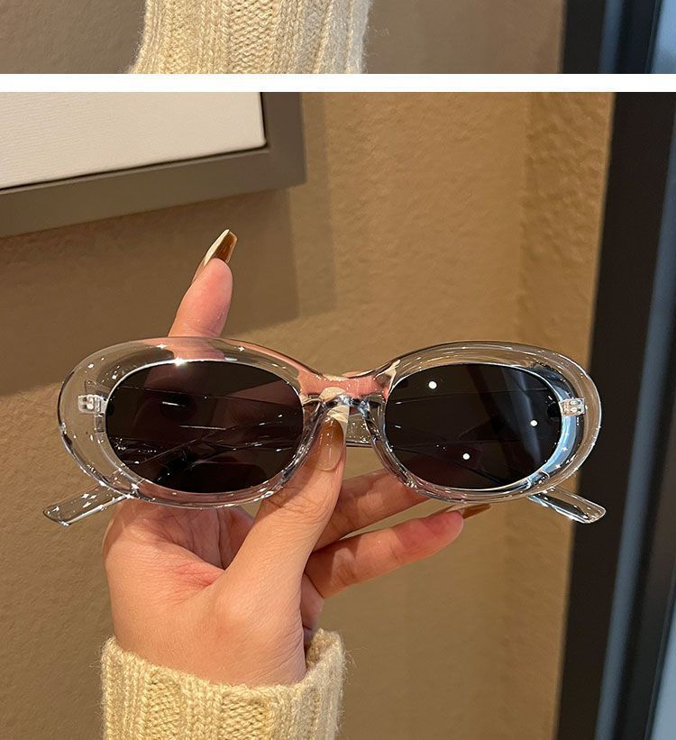 Oval white-framed sunglasses, European and American stylish sunglasses for taking photos, for women with big faces and cat-eye protection, high-end look, ins slimming pic 9