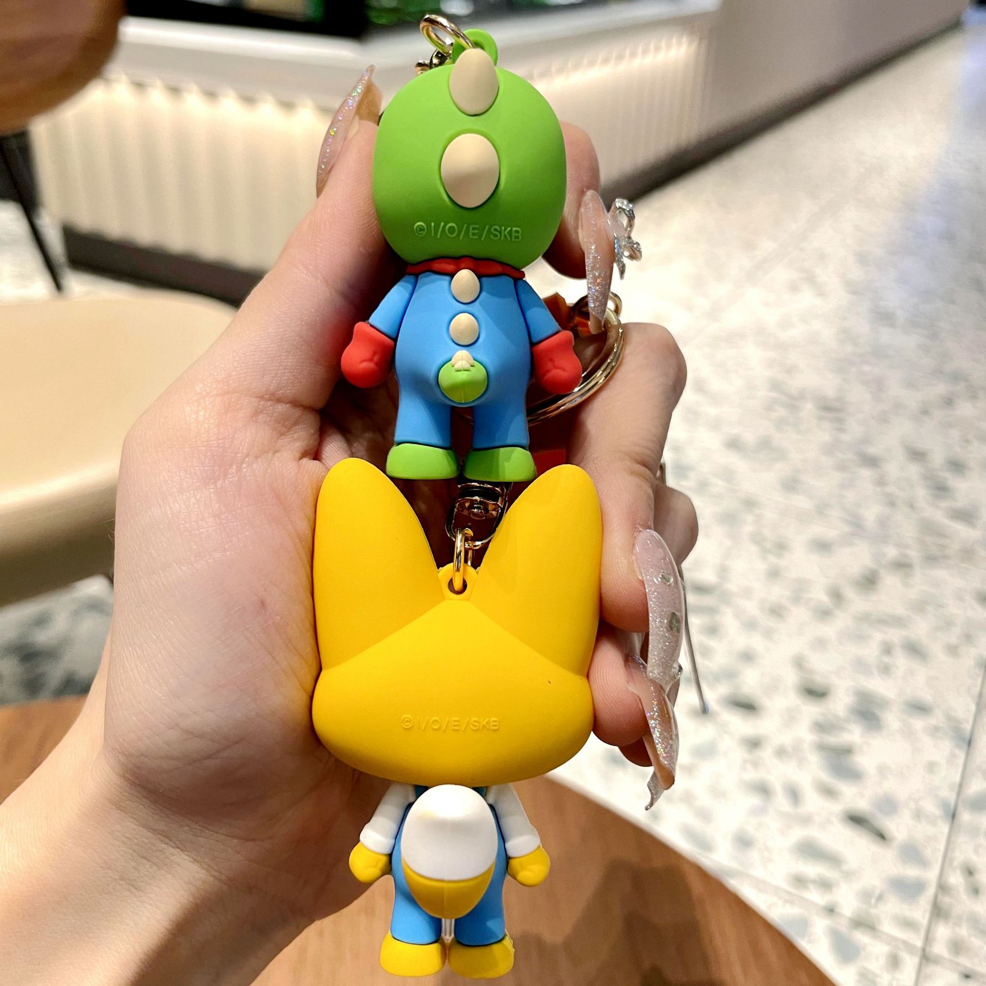 Wholesale of genuine creative Bolele cute cartoon dolls, keychains, couple schoolbags, small pendants, and popular online gifts pic 7