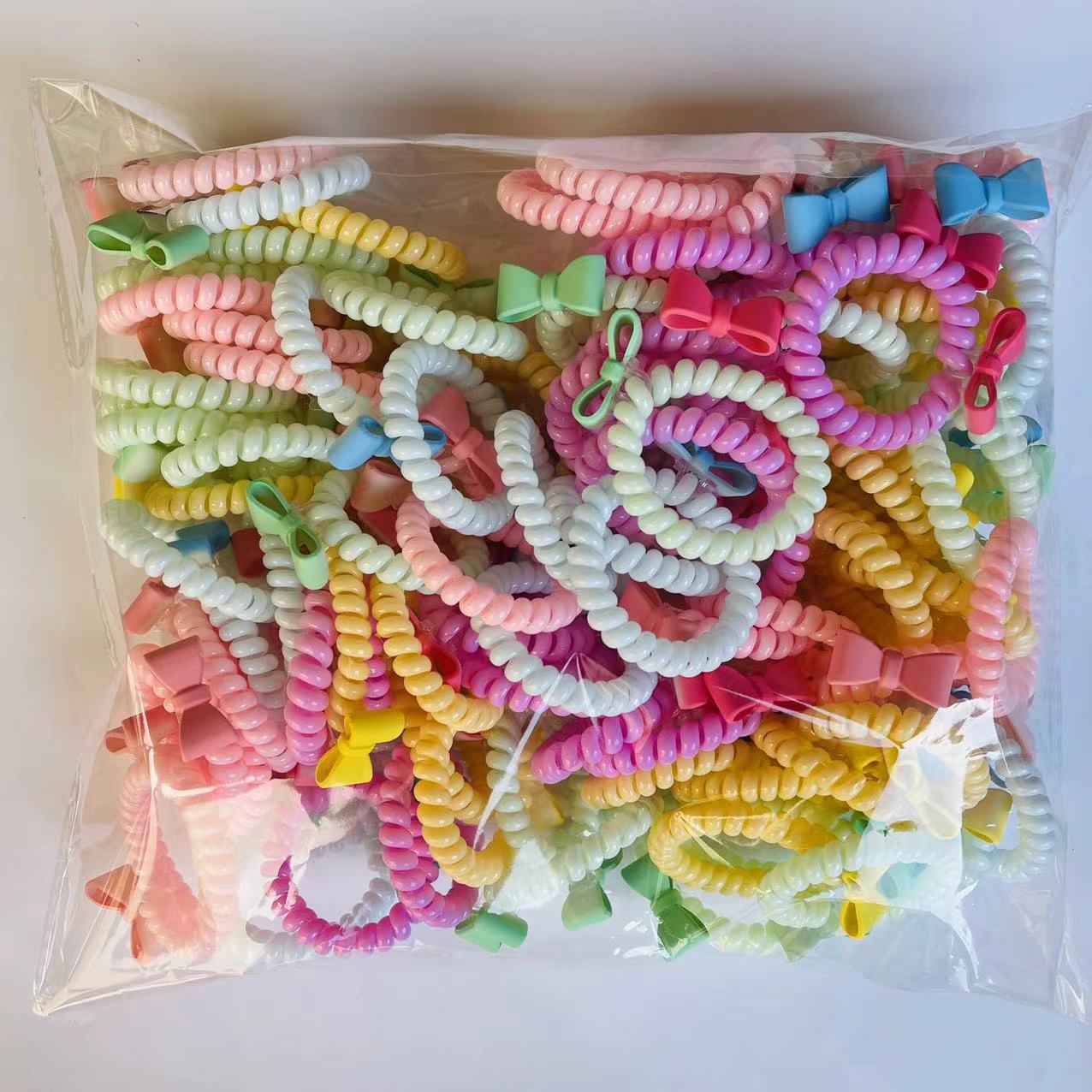 【1-9 Zones 】 Bow phone ring 100/ pack 5000/ box Spring candy-colored bow phone line hair tie Hair ring does not damage hair, good elasticity 1 yuan 2 yuan pic 1