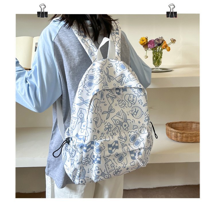 双肩包女时尚简约印花初高中大学生书包韩版潮流涂鸦休闲双肩背包详情21