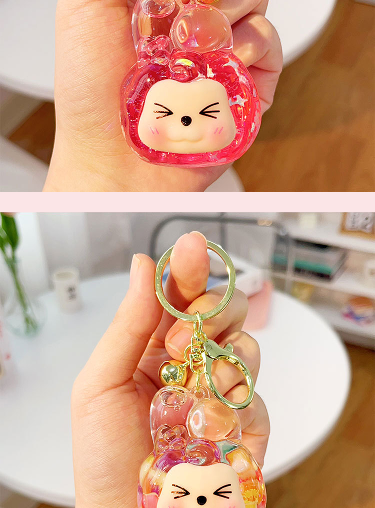 新款美乐蒂圣诞装饰球入油流沙钥匙扣迷你小挂件流沙直播摆件盲袋详情14