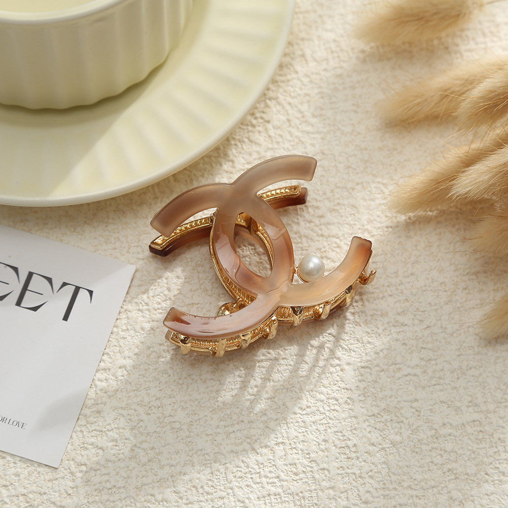 气质双C醋酸珍珠交叉抓夹半丸子头后脑勺盘发夹子鲨鱼夹现货批发详情5