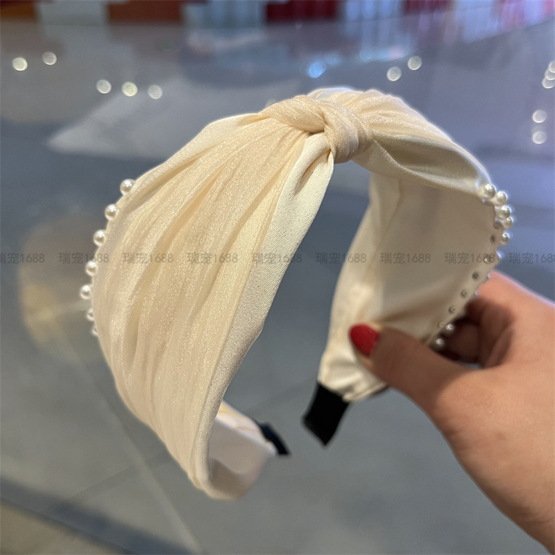 The new spring and summer headwear features a double-layer fabric with pleated yarn and asymmetrical beaded knots in the middle, creating a gentle and elegant hairband pic 5