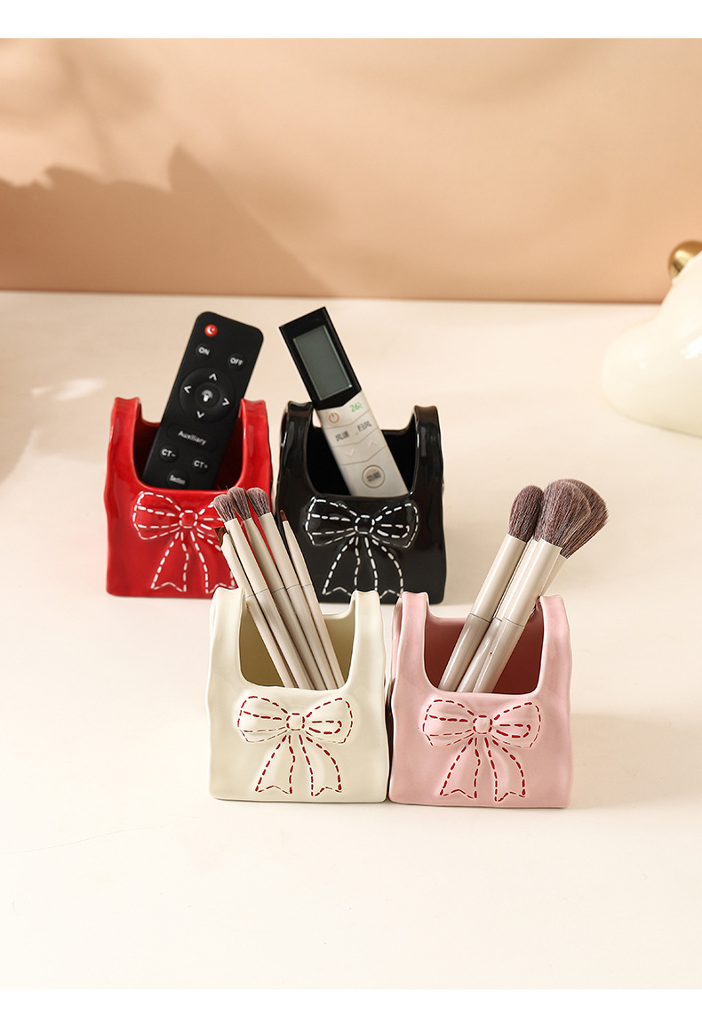 Desktop remote control, makeup brush storage box, creative bow, ceramic pen holder, home organizing stationery storage box pic 4