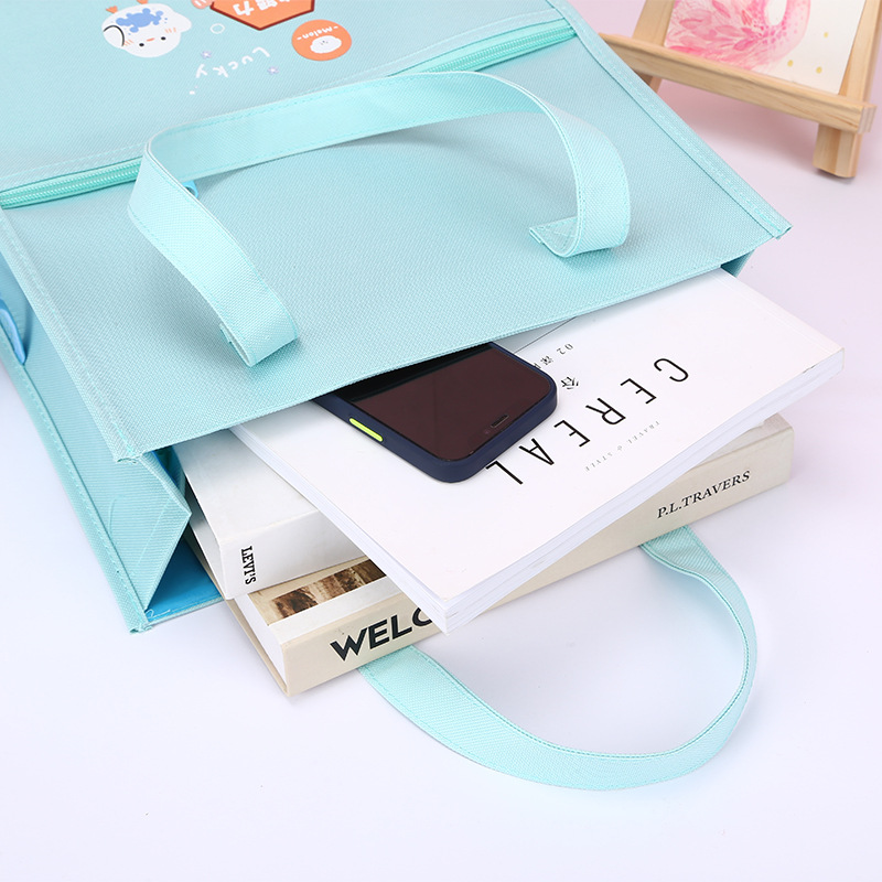 Factory direct supply of cartoon hand-held book bags for primary school students, lightweight and reducing burden. Carefully selected bags for after-school training and remedial classes. Practical and durable school bags for primary school students pic 3