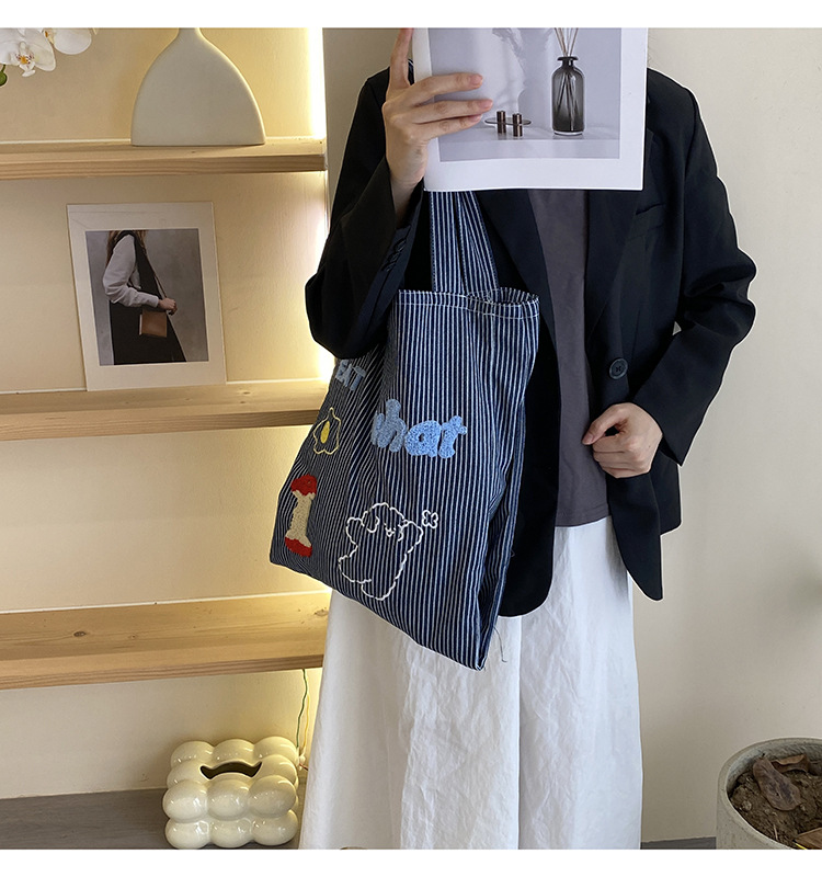 韩版时尚条纹帆布包包女2024新款大容量通勤托特包小众休闲布包详情13