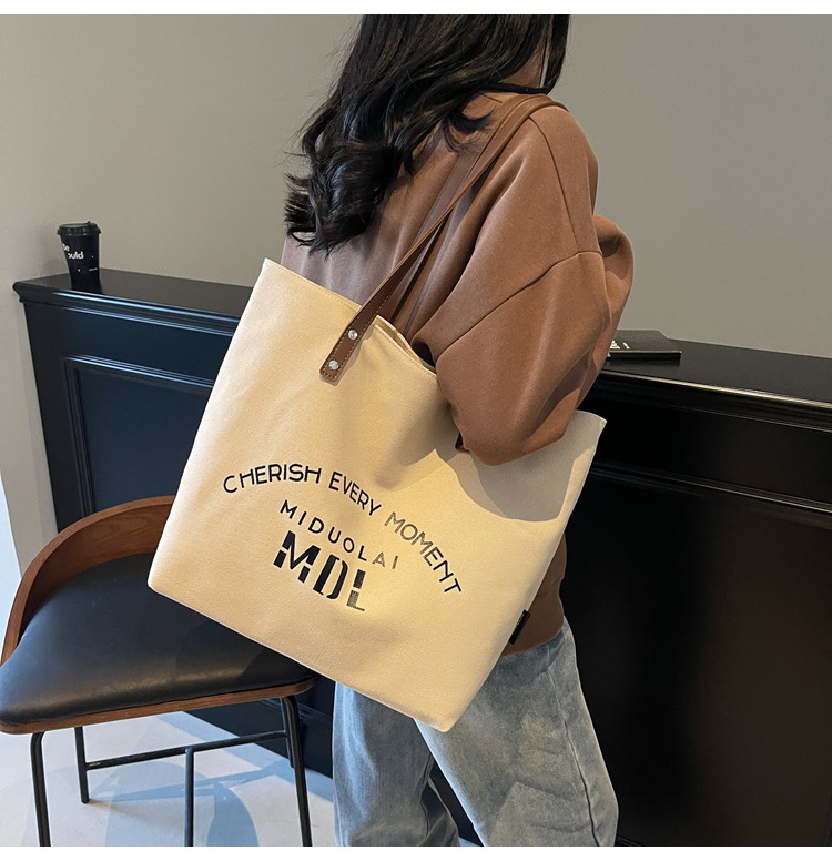 Large-capacity 2025 new style simple single-shoulder hand-carry cloth bag, college student class tote bag, versatile canvas bag for women pic 17