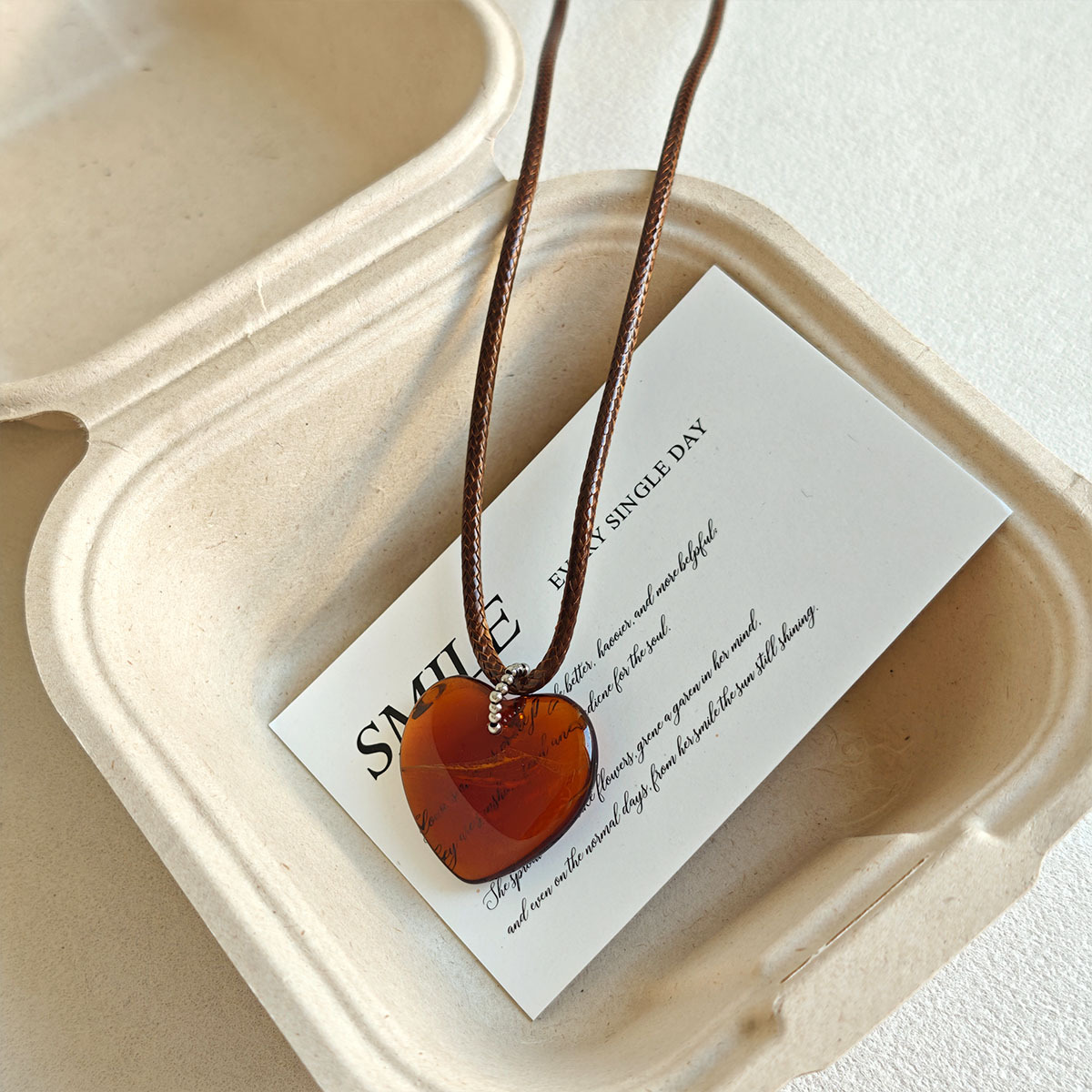 Retro rock sugar amber heart-shaped pendant necklace for women, adjustable wax rope, long sweater chain for autumn and winter, a niche accessory pic 5