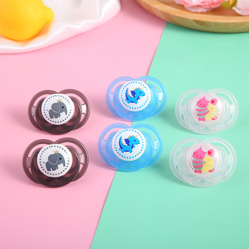 Wholesale of cartoon portable printed baby pacifiers with LIDS, silicone for babies to sleep soundly, durable and safe to play with pic 1