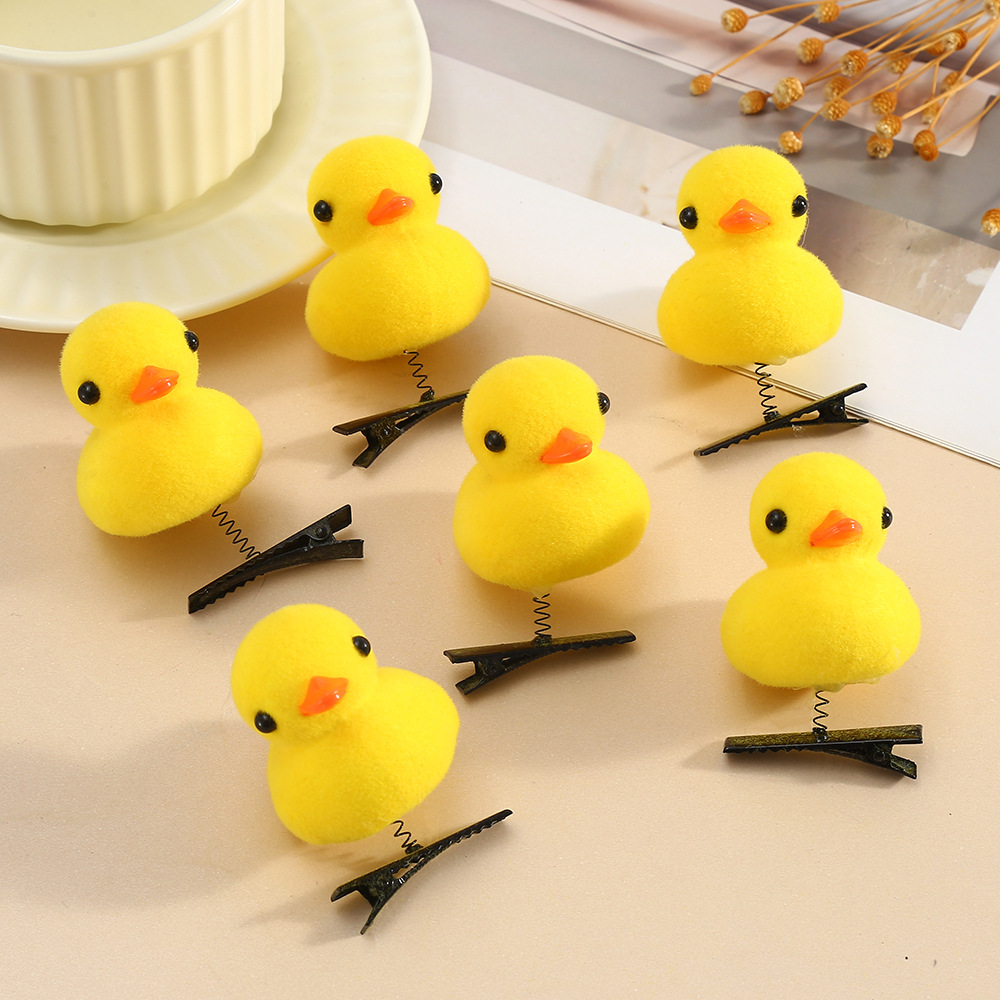 网红爆款儿童专用小黄鸭发夹 可爱卖萌立体弹簧夹发饰 毛绒卡通造型 批发优惠详情2