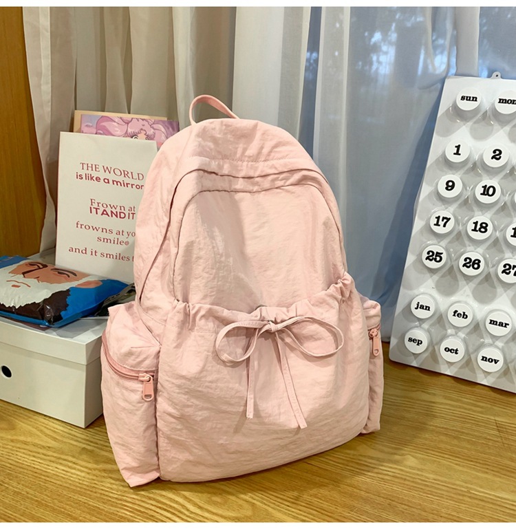 新款时尚轻便简约双肩包女日系文艺学生书包休闲运动旅行纯色背包详情37