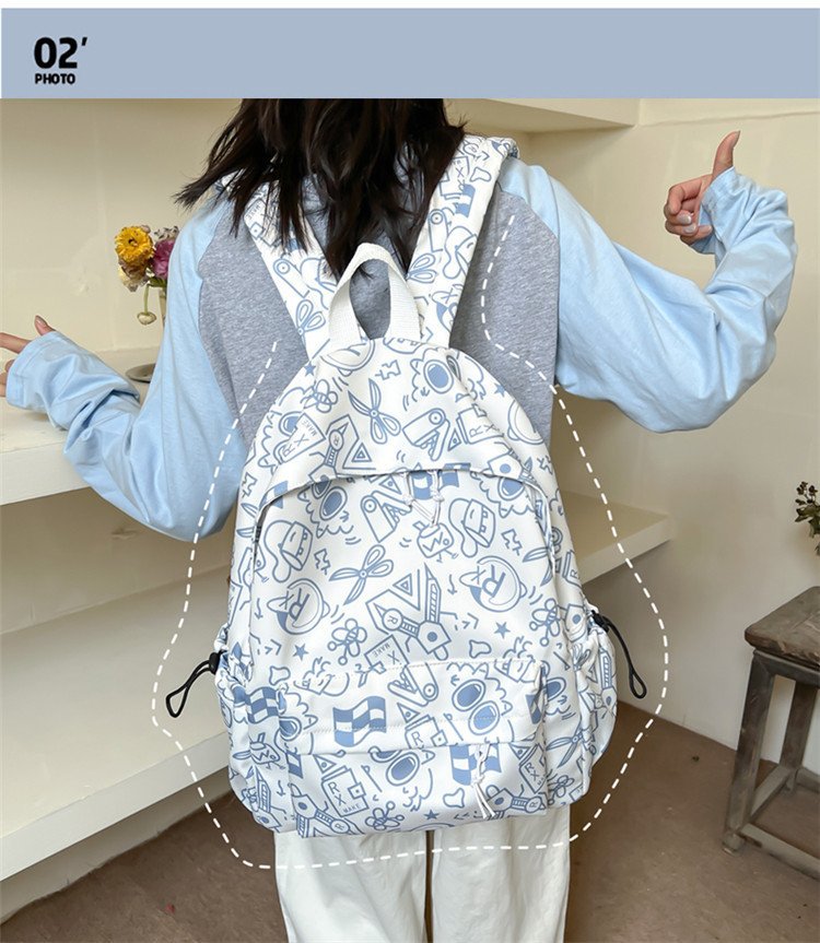 双肩包女时尚简约印花初高中大学生书包韩版潮流涂鸦休闲双肩背包详情3