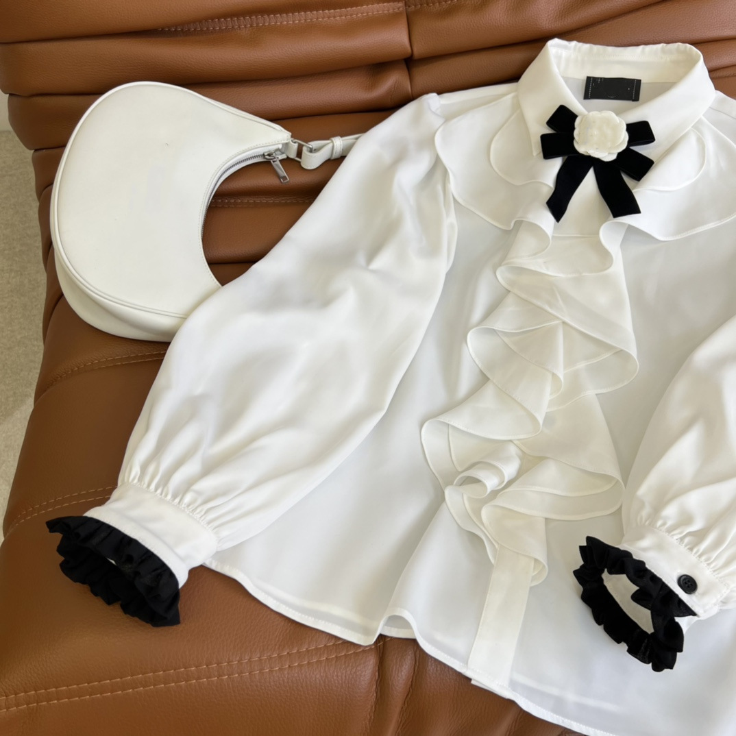 Shenzhen Nanyou high-end original single Xiaoxiangfeng 2022 Spring/Summer French romantic color-blocking black fungus lace bow tie decorated shirt pic 10