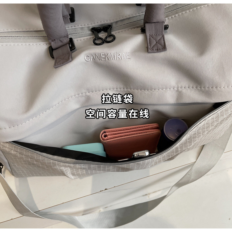 短途旅行包女轻便多功能斜挎运动健身包手提出差大容量收纳行李袋详情5