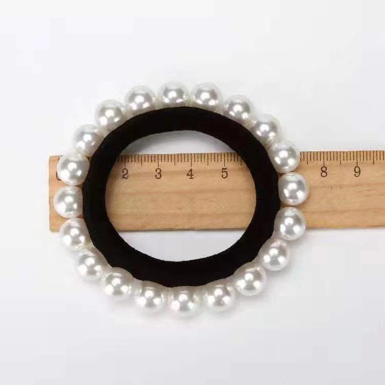 The new pearl hair band and towel band from Dongdaemun, South Korea, are simple and versatile. It also features a hair tie and a rubber band pic 2