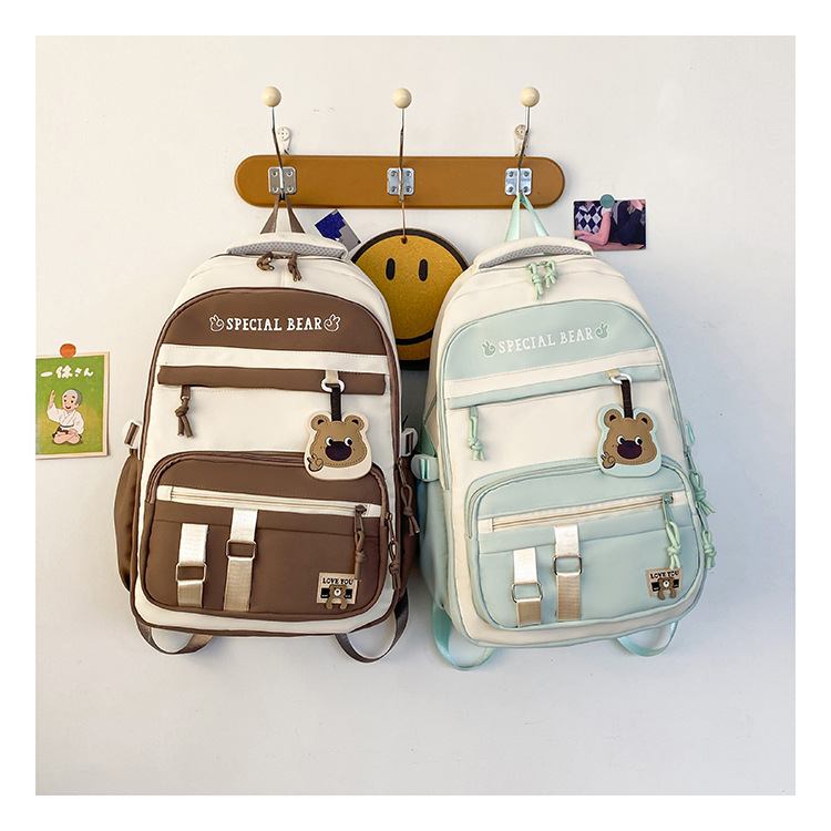 批发新款初高中学生大容量书包轻便减负背包小学生简约结实双肩包详情34