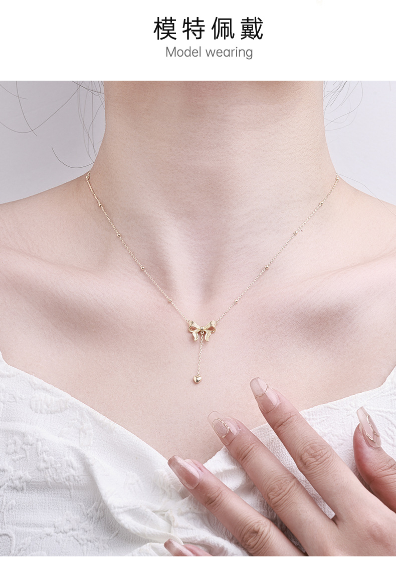 影响力饰品跨境在逃公主黄金色蝴蝶结项链长款毛衣链爱心吊坠流苏锁骨链女详情3
