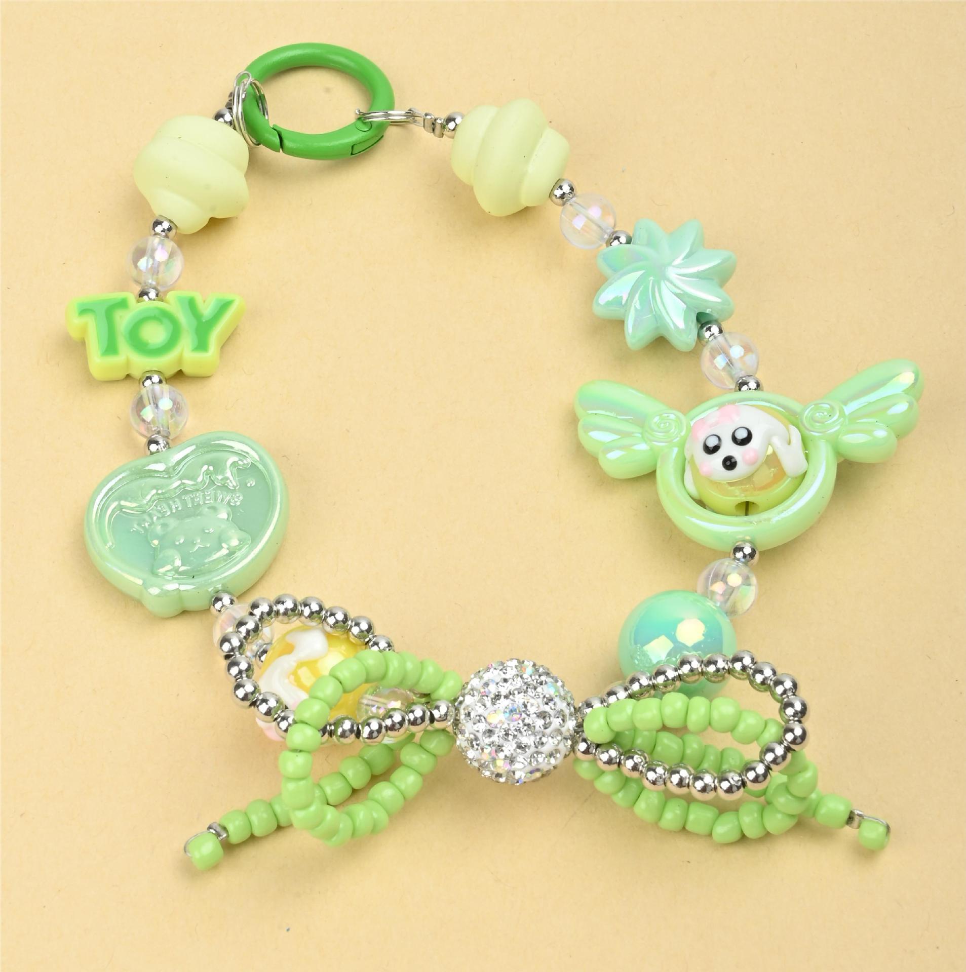 Wholesale of irregular handcrafted beaded diamond balls, double-layer bow ties, mobile phone chains, keys, bags and pendants in the Japanese and Korean ins style pic 4