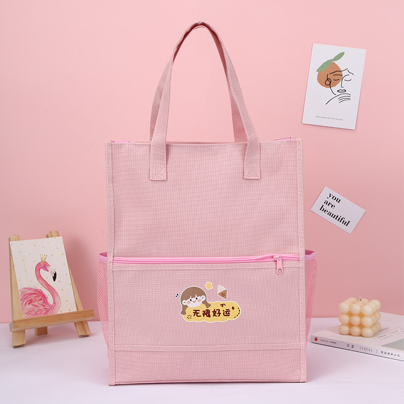 Factory direct supply of cartoon hand-held book bags for primary school students, lightweight and reducing burden. Carefully selected bags for after-school training and remedial classes. Practical and durable school bags for primary school students pic 5