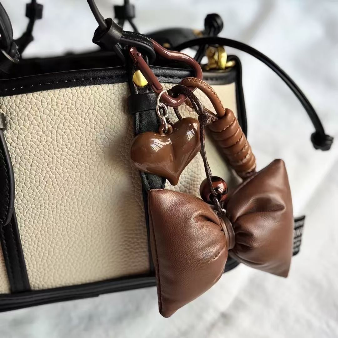Original coffee-colored miu series bag pendant with a stylish and high-end leather texture, handcrafted autumn and winter brown bag pendant pic 5