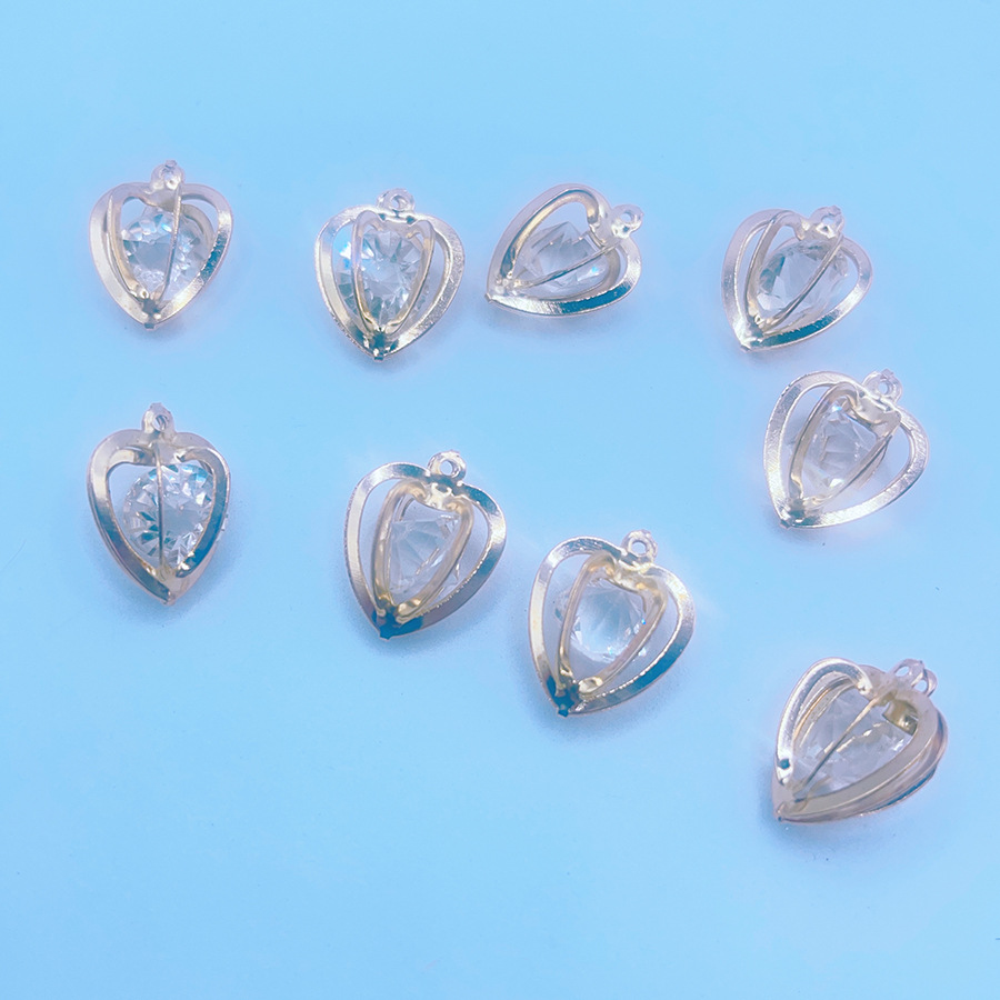 Yiwu table buckles, hotel table setting special ceramic decorative plates, high-end porcelain napkin buckles, table napkin buckles, ceramic plates, exquisite dining decorations: DIY glass diamond heart jewelry accessories, crystal diamond setting pic 1