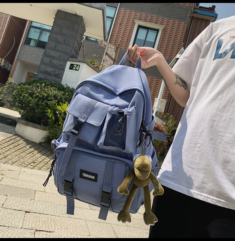 休闲百搭男女双肩包可爱挂件洋气潮流学生书包大容量工装风背包详情17