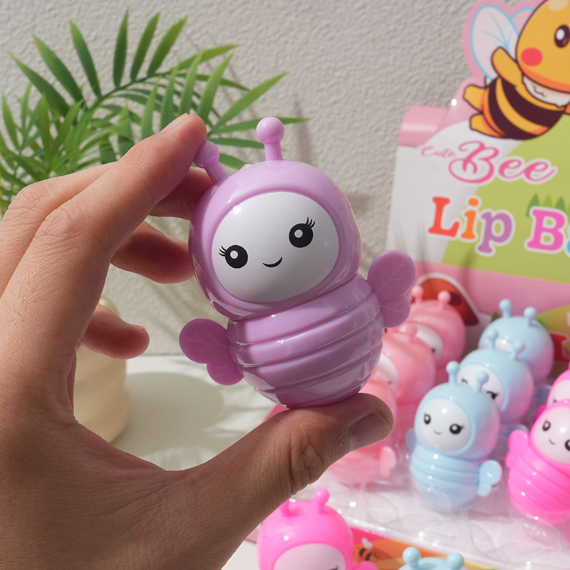跨境外贸出口保湿滋润唇膏 创意宇航员学生卡通补水不脱色润唇膏详情5