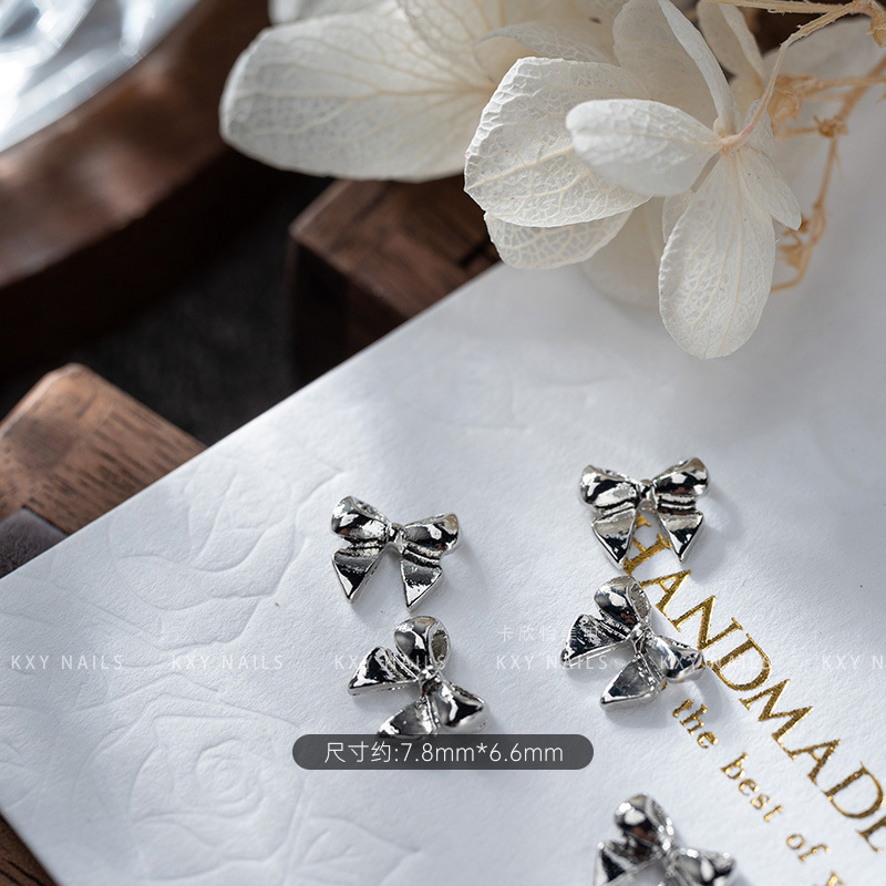 The alloy butterfly bow tie series of nail art accessories is a popular three-dimensional bestseller. It is a high-end and light luxury nail accessory with a butterfly diamond pattern pic 9
