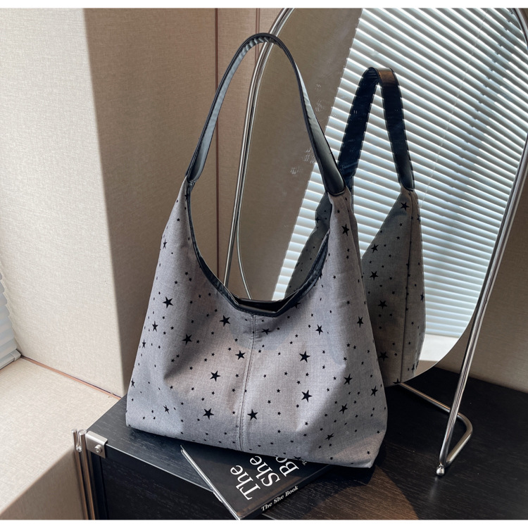 通勤大容量女包新款流行波点单肩包时尚百搭托特水桶包都市斜挎包详情18