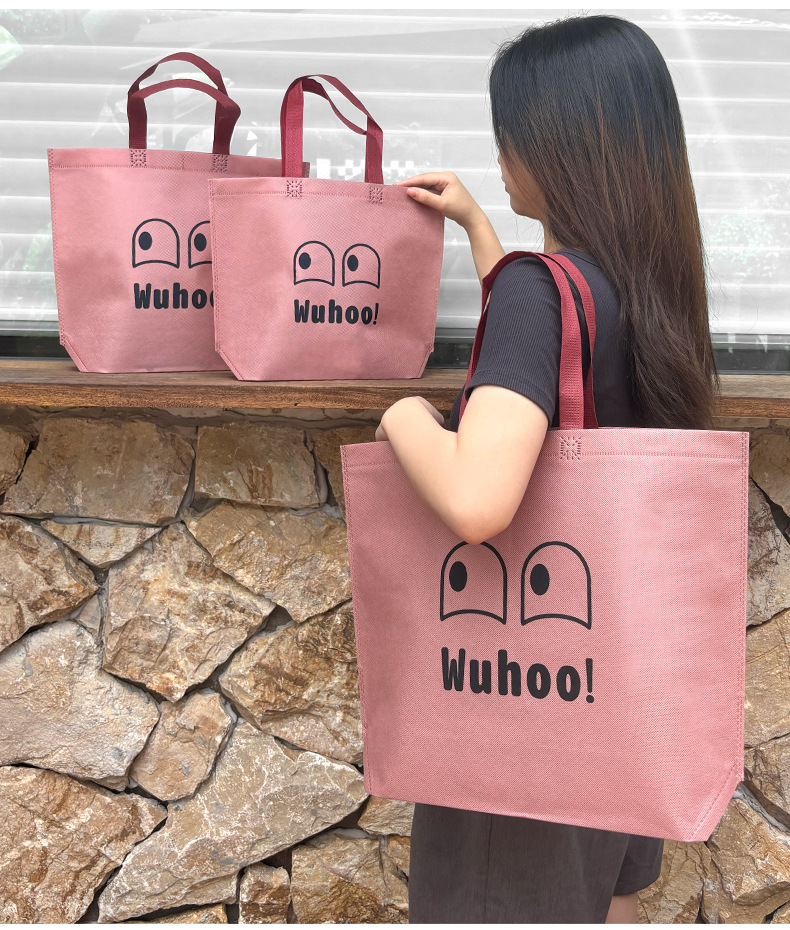 Creative Internet celebrity eye non-woven fabric bags, universal in-stock handbags, beveled gift bags, gift shop accessory packaging bags pic 3