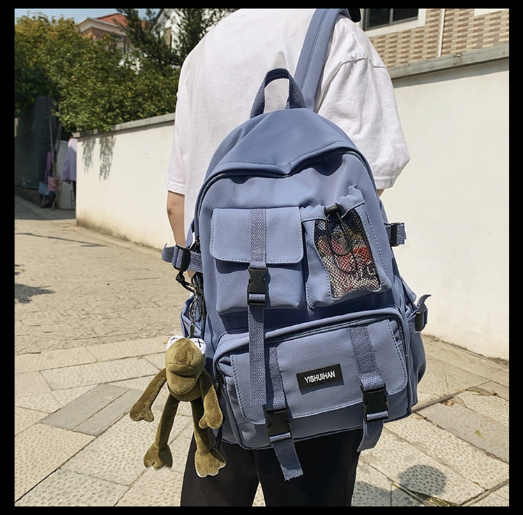 休闲百搭男女双肩包可爱挂件洋气潮流学生书包大容量工装风背包详情12