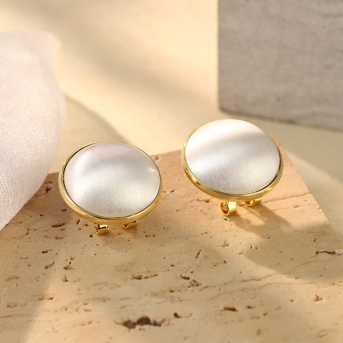 French geometric metal minimalist earrings with an irregular texture, white lava ring and enamel adjustable joints pic 31
