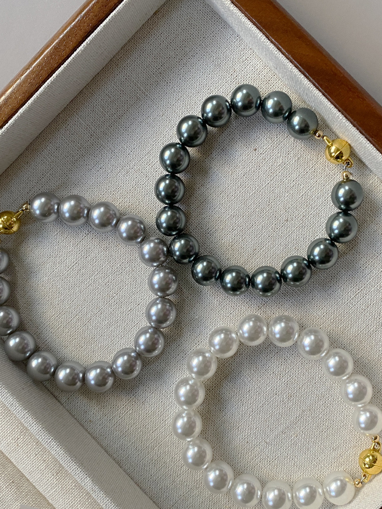 This is a trendy accessory for women, featuring a strong Australian white round magnetic pearl bracelet. It exudes a light luxury, niche and high-end vibe pic 20
