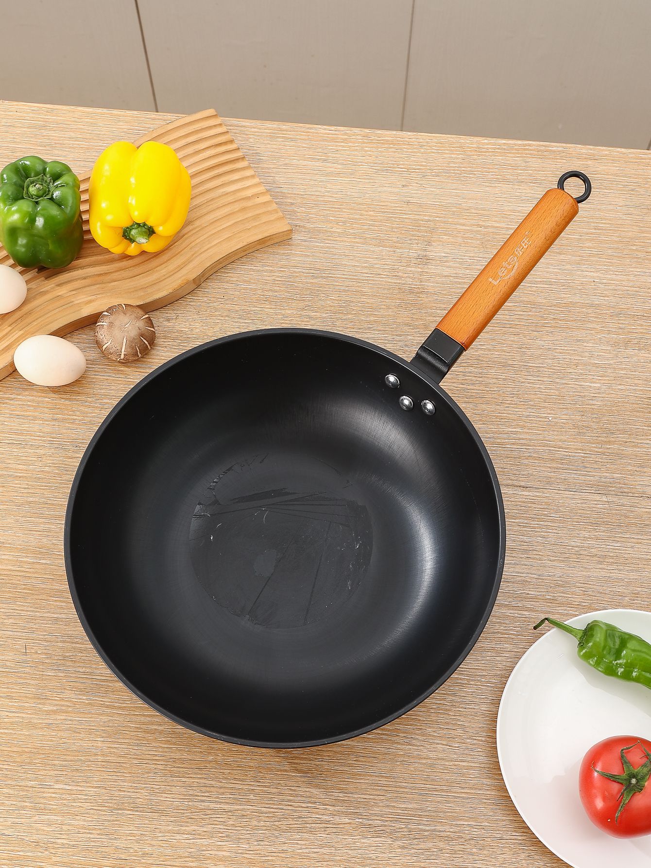 乐氏精制铸铁真不锈炒锅工厂批发不易粘锅不易生锈铁锅超市同款锅详情7