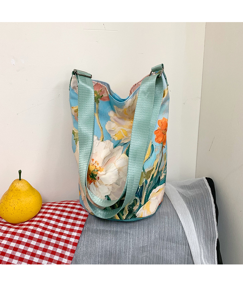 大容量国风印花水桶包女创意花卉个性手提单肩包设计感休闲斜挎包详情12