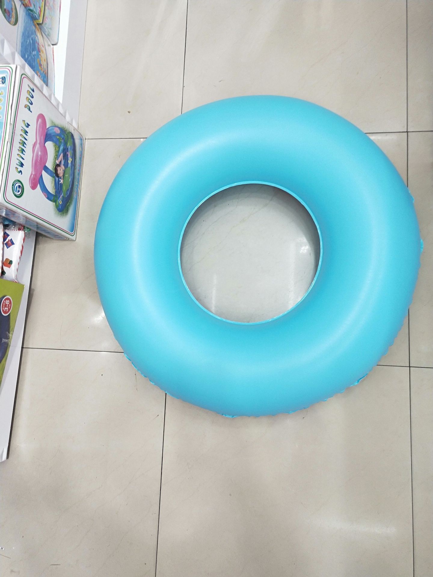 厂家直供新款成人充气游泳圈90cm带手柄水上救生圈卡通气模玩具畅销款详情9