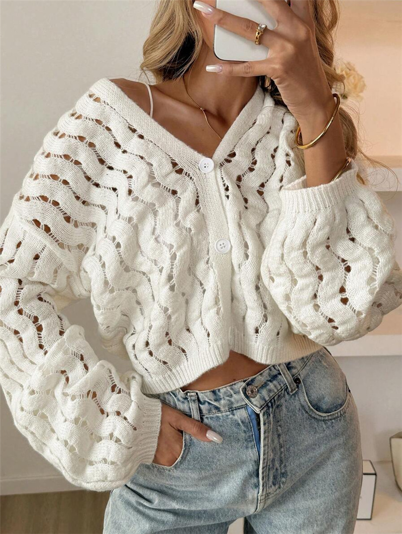 This cross-border Amazon knitted coat from Europe and America is a casual, hollowed-out button solid-color long-sleeved sweater with a strong sense of design pic 5