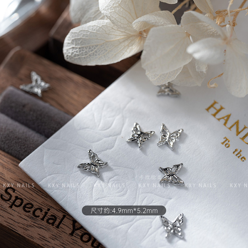 The alloy butterfly bow tie series of nail art accessories is a popular three-dimensional bestseller. It is a high-end and light luxury nail accessory with a butterfly diamond pattern pic 5