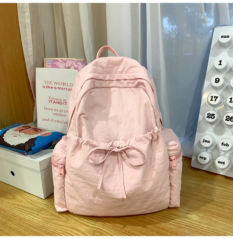 新款时尚轻便简约双肩包女日系文艺学生书包休闲运动旅行纯色背包详情38