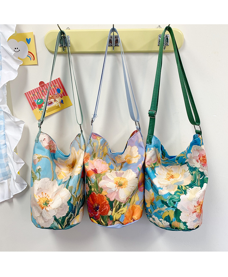 大容量国风印花水桶包女创意花卉个性手提单肩包设计感休闲斜挎包详情18