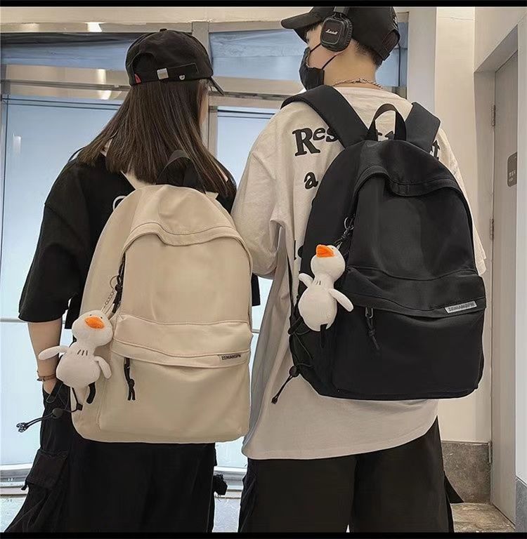 日系初高中学生上课书包男新款洋气质感纯色简约休闲女生双肩背包详情5