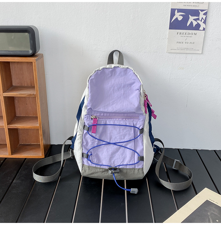 户外双肩包抽绳迷你休闲包轻便百搭旅行登山包女轻便旅游小背包详情49